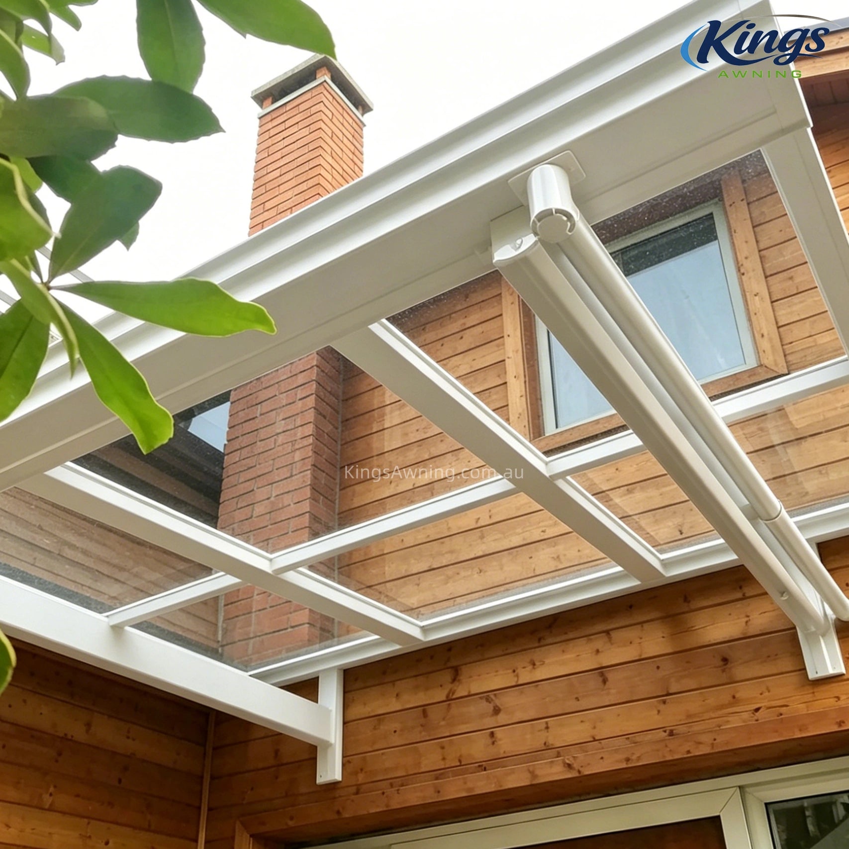 Close-up of white awning frame with house chimney