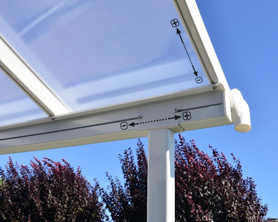 White adjustable patio cover post and frame with clear roof, outdoor setting, blue sky