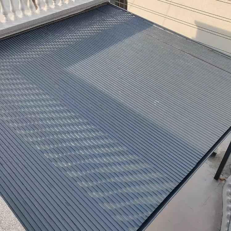 Custom metal awning installed on patio, durable, weather-resistant, by Kings Awning